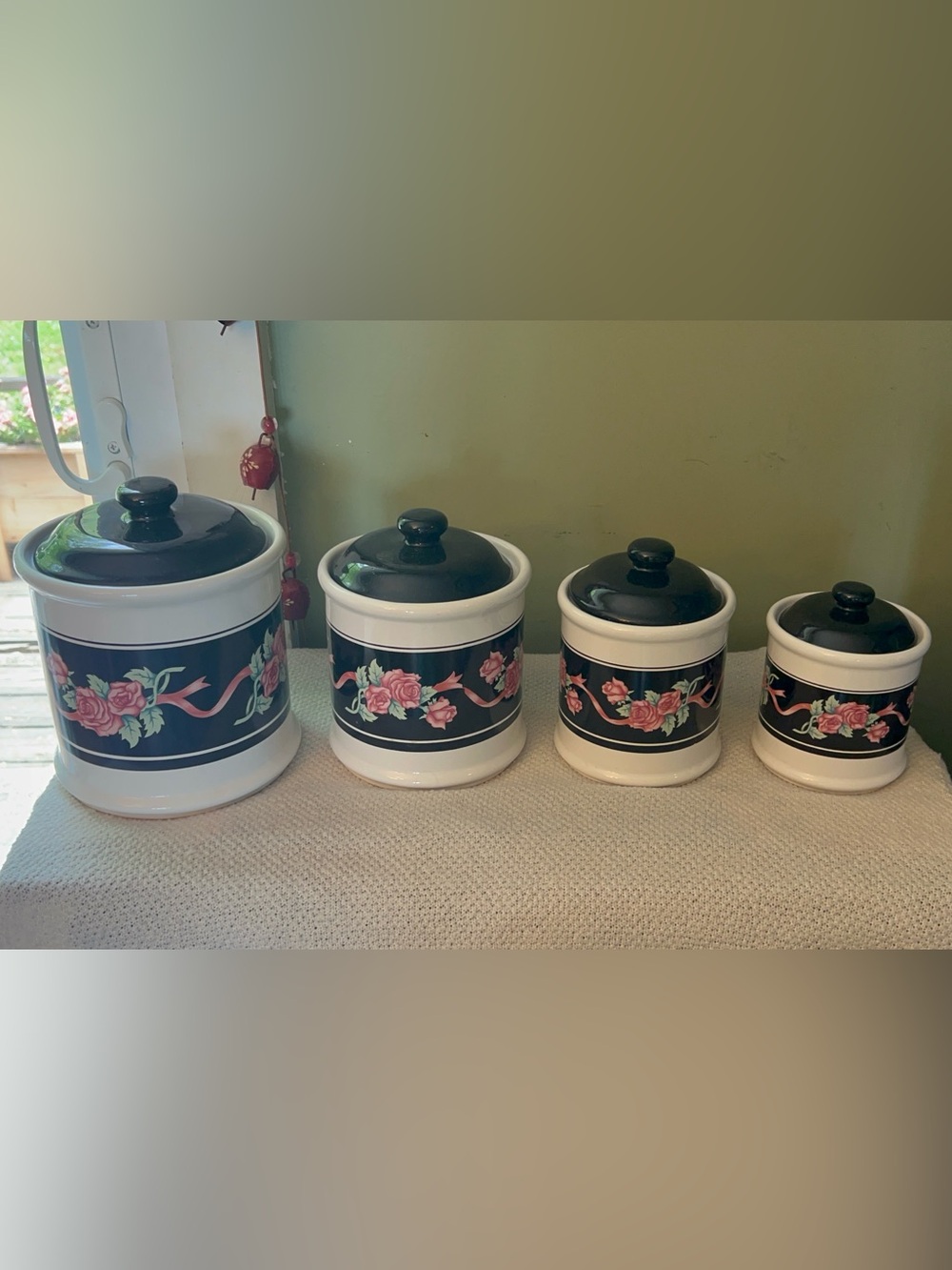 Vintage House of Lloyd 4-piece kitchen canister set in the "Evening Garden"